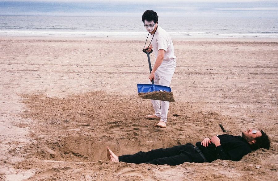 The rebirthday party took turns burying Eric Alive